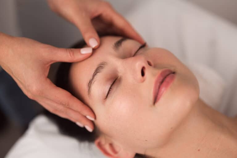 anonymous-masseuse-doing-face-massage-to-relaxed-f-2025-03-15-18-43-37-utc (1)